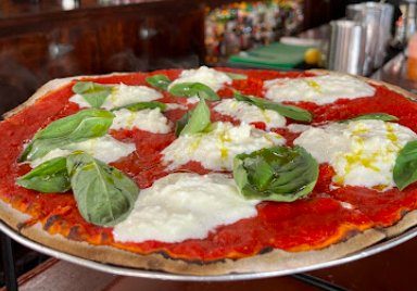 Melfi's signature dishes Cacio E Pepe
Stretch Armstrong Pizza
Duck Ragu